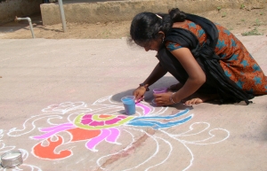 A Kolam drawing made of rice powder and marble dust